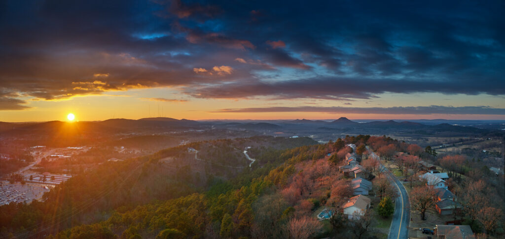 A wintertime sunset from Walton Heights in Little Rock featuring Pinnacle Mountain. 